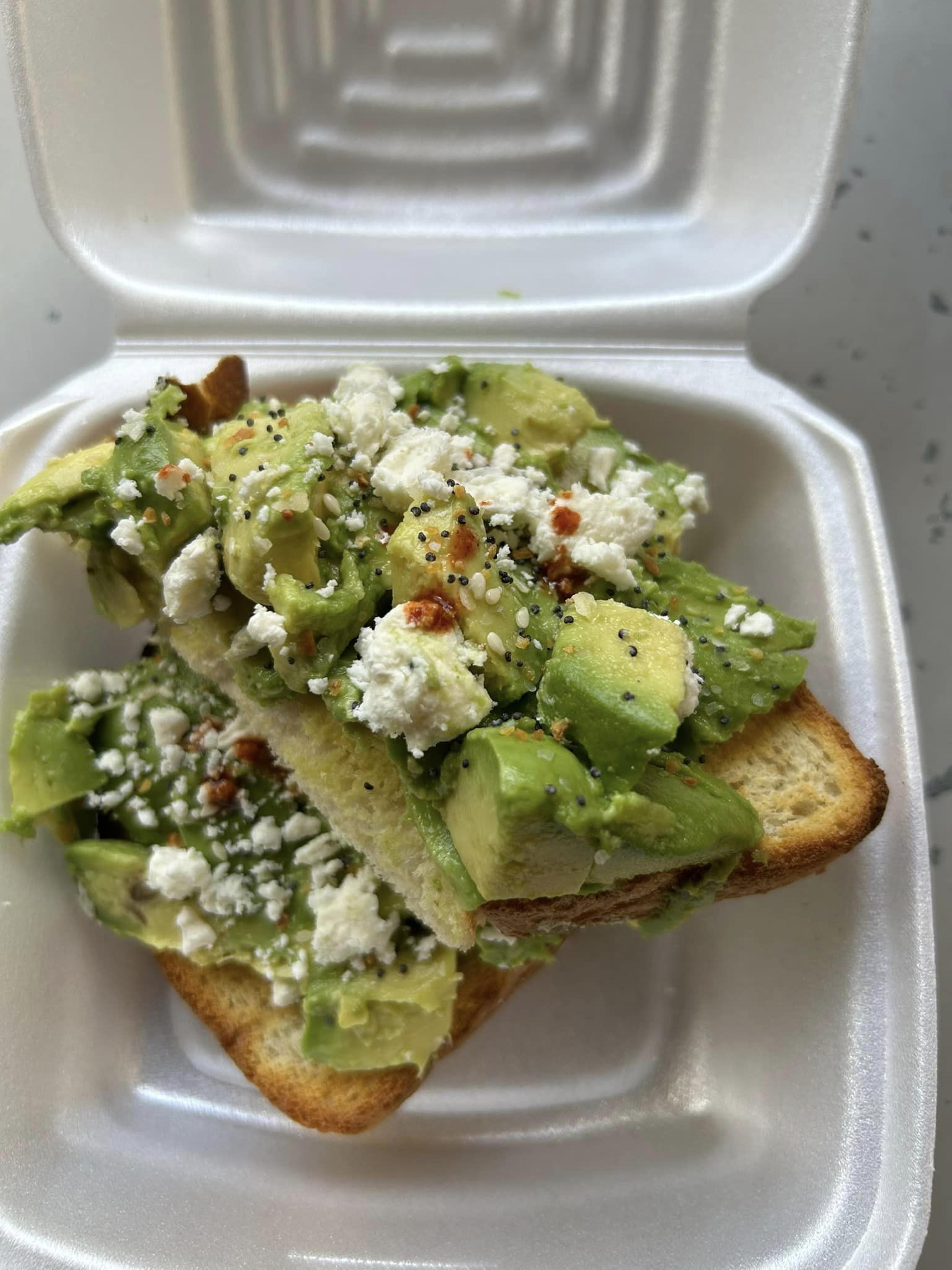 A delicious piece of avocado toast from Bean Around the Block .